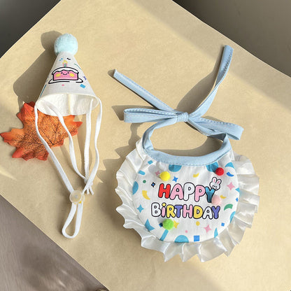 Blue pet birthday bib and matching party hat